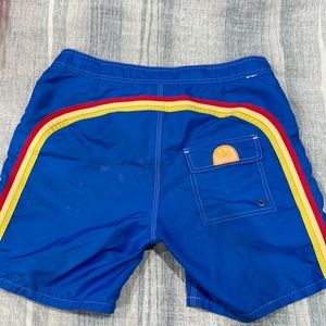 Sundek red yellow and blue. Size 32 waist